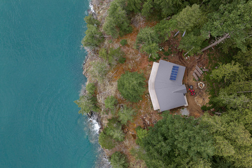 gambier island residence bc aerial top down solar panels oceanfront.jpg