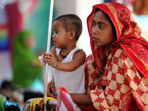 Child deaths linked to Bangladesh measles outbreak rise.jpg