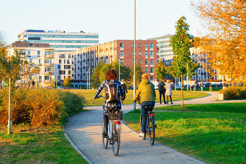 Girls on bicycles in the public park in Vilnius, Lithuania..jpg