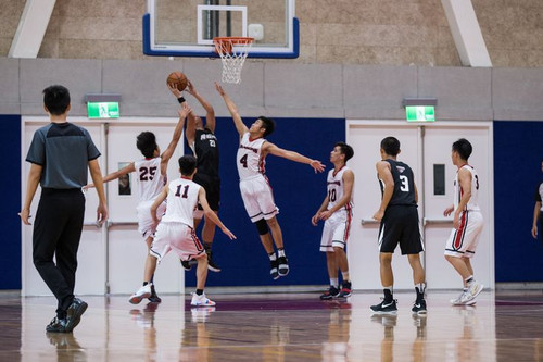 Student playing basketball Using shutter speed skill, captured students playing basketball jump to b.jpg