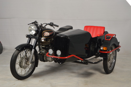 Retro Royal Enfield Motorcycle with Elegant Sidecar Build.jpg