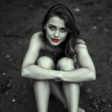 image of a beautiful woman sitting on the ground w by karoglan46 dlrnzuf