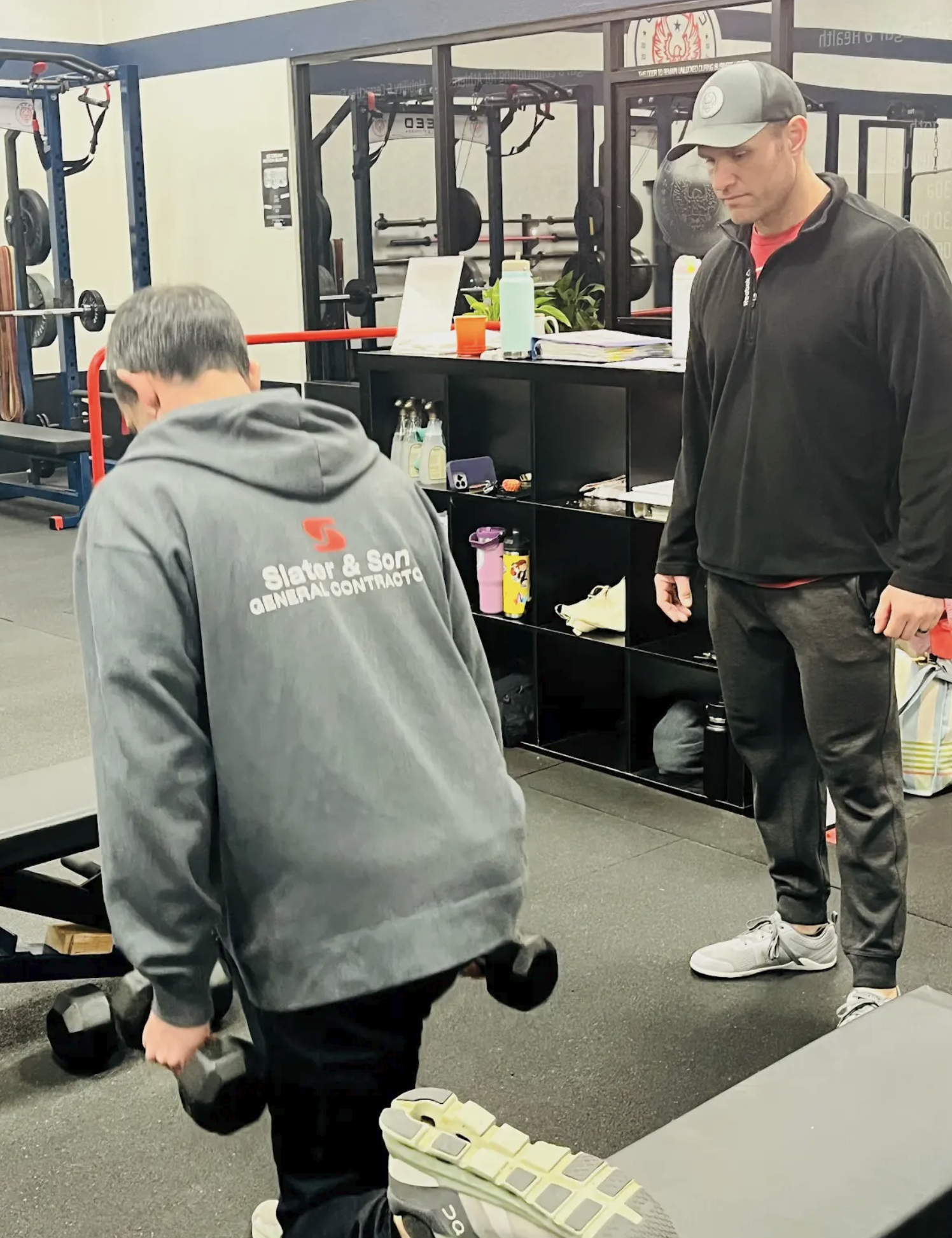 Taylor Catrett coaching a Creed Strength and Fitness member during training