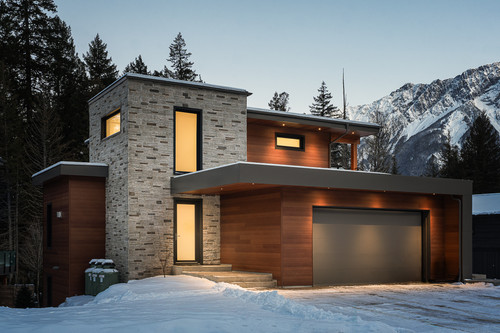 eagle residence pemberton exterior front twilight warm interior glow.jpg