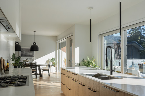 eagle residence pemberton kitchen island waterfall quartz mountain view.jpg