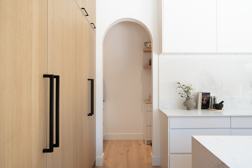 eagle residence pemberton arched pantry doorway oak panel fridge.jpg