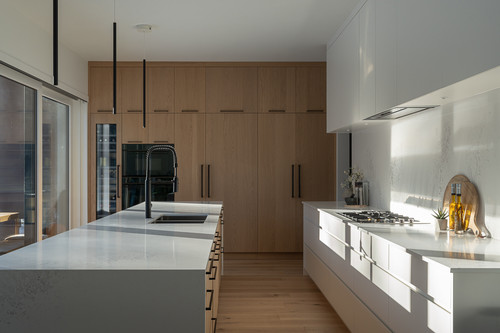 eagle residence pemberton kitchen oak pantry wall white cabinetry.jpg
