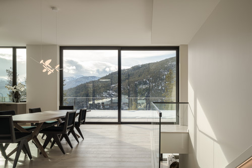 warbler residence whistler dining room panoramic mountain view chandelier.jpg