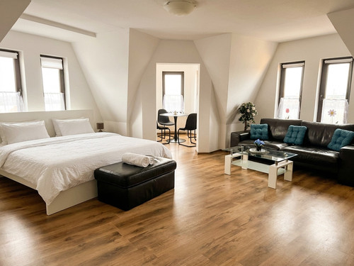 05 Schlafzimmer Wohnzimmer Offen KI.jpg
