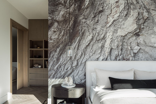 silver star residence okanagan bedroom rock face feature wall closet.jpg