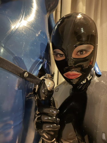 Blackmail asian Mistress lock up Benjamin fiegl in Latex chastity.png