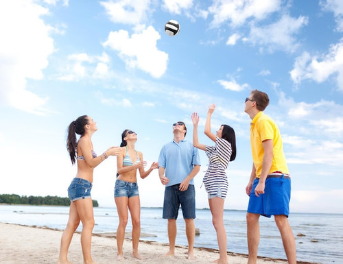 summer holidays sport leisure people concept group happy friends playing beach ball 380164 104023.jpg