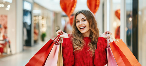 vecteezy smiling woman with shopping bags in mall decorated for 73862186.jpg