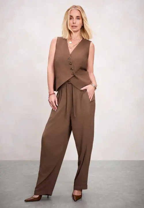 louise redknapp in brown vest set for peacocks march 2026 0.webp