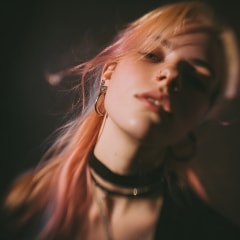 soft focus studio portrait of a woman with long pastel hair, head tilted, subtle motion blur, wearin.jpg