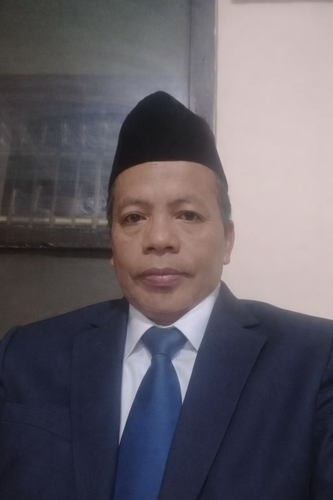 Southeast Asian man in formal attire.png