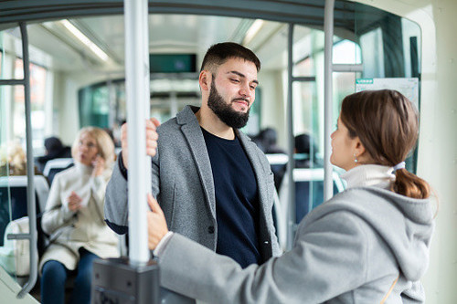 portrait of playful positive people making acquaintance in public picture id1217651209.jpg