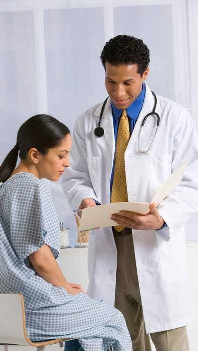 physician talking to his patients wjcbuusy3ffgrp89.jpg