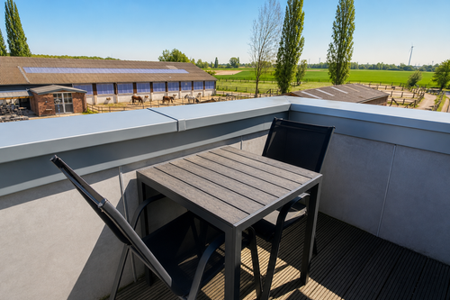 04 Balkon Sitzgruppe Panorama.png