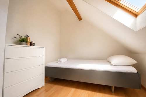 08 Schlafzimmer OG Mansarde.png
