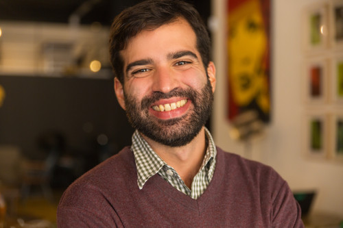 closeup happy joyful bearded guy posing indoors.jpg