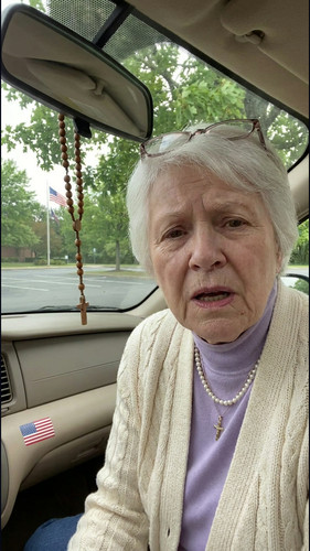 g16 patricia parked car husband.jpg
