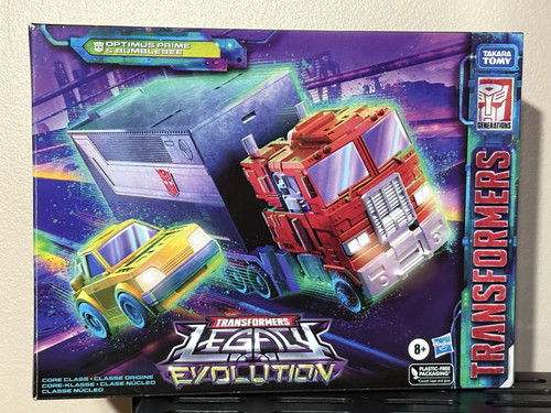 LEGACY CORE OPTIMUS PRIME AND BUMBLEBEE SET MIB (OPEN DISPLAYED) $70.jpg