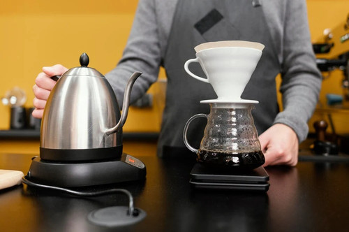 imgi 64 male barista with apron kettle 23 2148824419.jpg