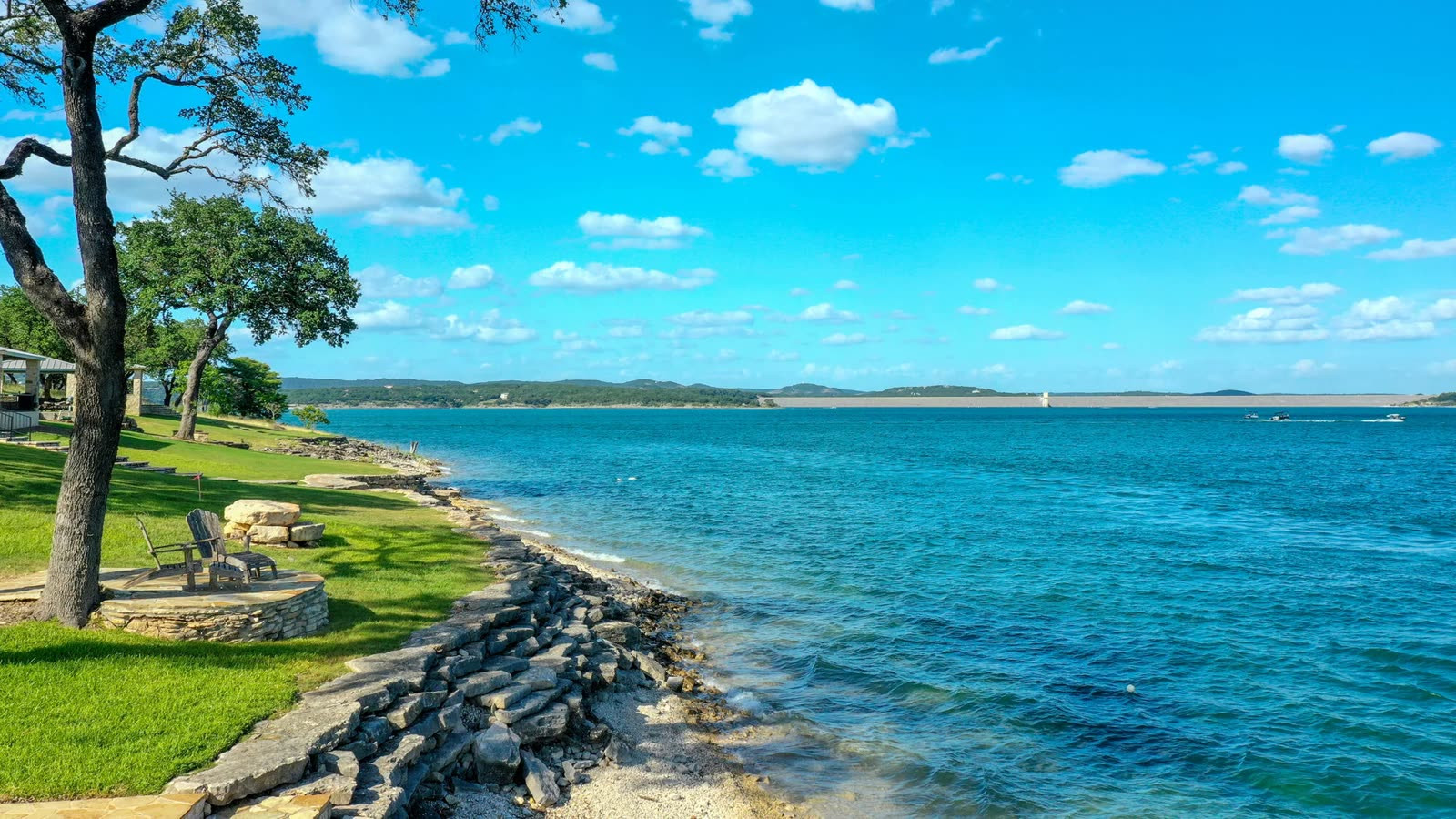Luxury waterfront home on Canyon Lake Texas with boat dock and Hill Country views
