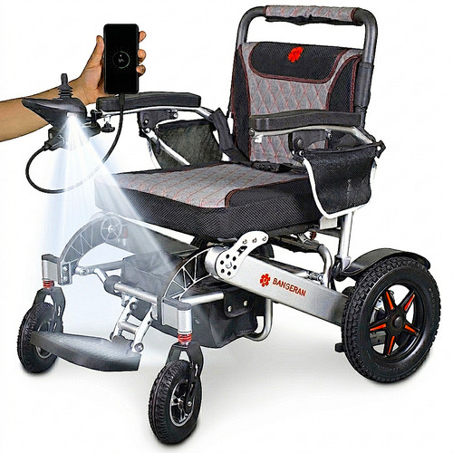 electric wheelcahir with headlights and charging.jpg