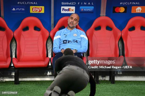 ISTANBUL, TURKEY - JUNE 09: Pep Guardiola, Manager of Manchester City, looks on from the bench ahead.jpg