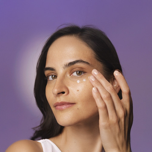 li person with herbalife skin nourishing eye cream.jpg