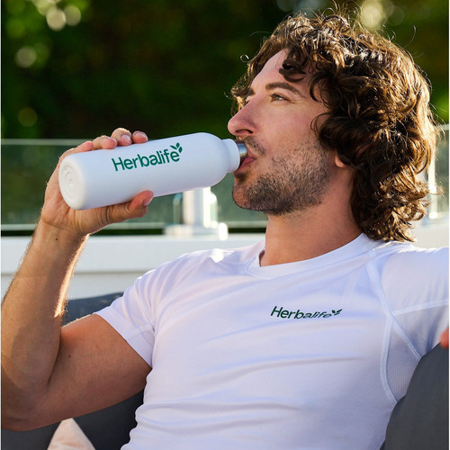 li man drinking beverage morning.jpg