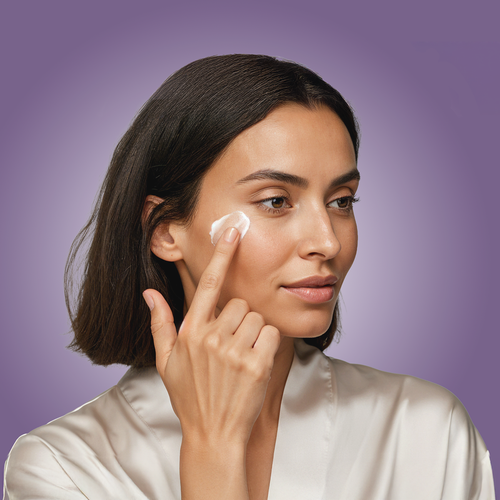 li woman using night cream.png