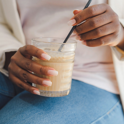 li woman holding shake.jpg