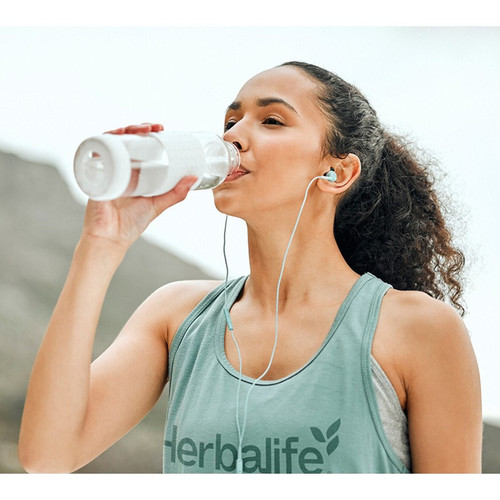 li woman drinking water outside.jpg