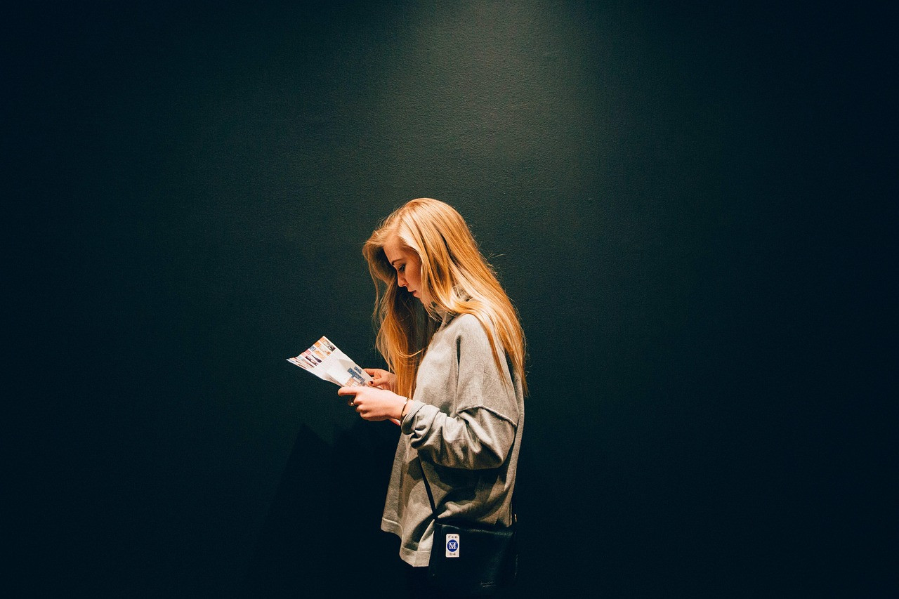 adult, dark, fashion, girl, light, magazine, person, reading, sweater, woman, black fashion, black light, black reading, black dark, black lights, magazine, reading, reading, reading, reading, reading