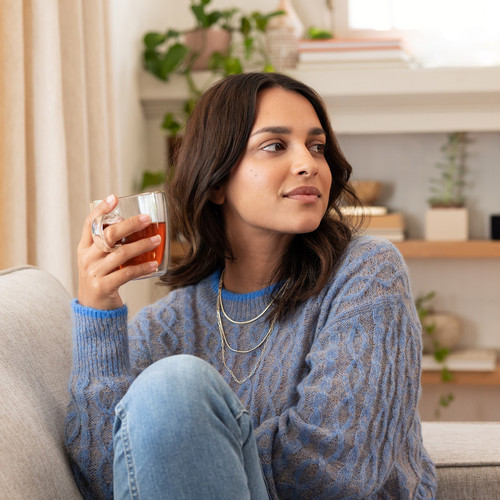 li woman holding tea.jpg