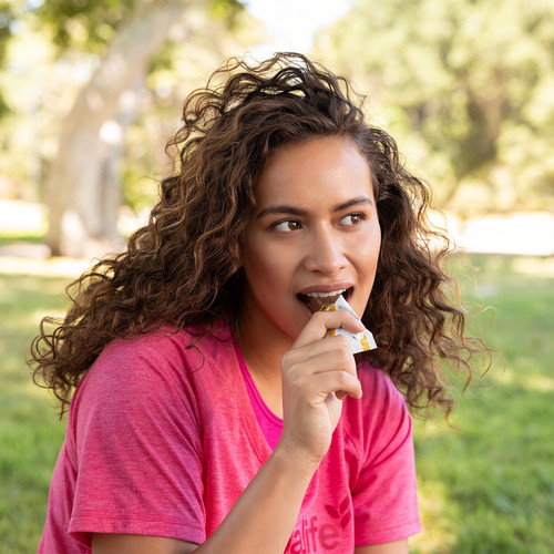 li woman eating bar.jpg