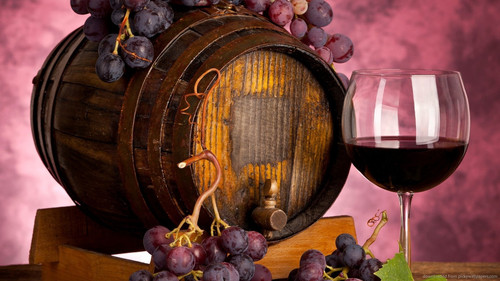 Glass Of Wine Near The Small Barrel Wallpaper.jpg