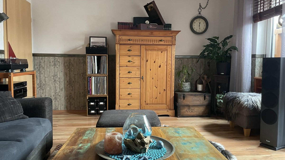 Living room vinyl setup with turntable and storage furniture