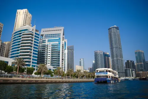 Celeste luxury boat on dinner cruise Dubai Marina beside palm lined promenade (1).webp