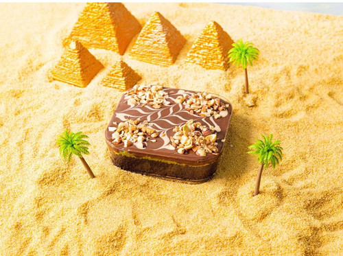 كيكه الهبه دلع بغداد نوتيلا مكسرات.jpg