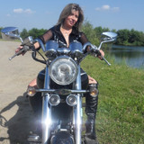 Lisa en tenue de salope sur la moto 06