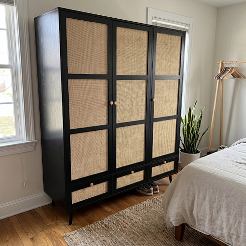 Our wardrobe with drawers and shelves handles the lodger's son's room.png
