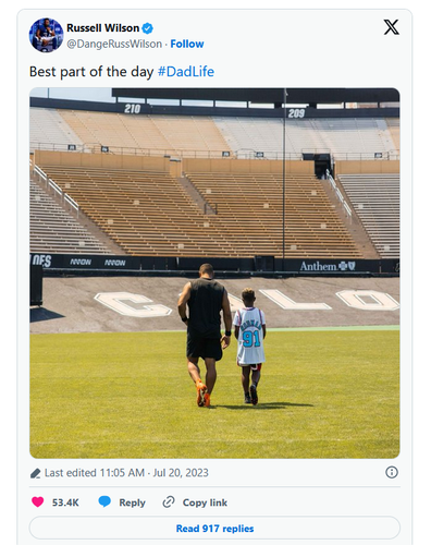Russell Wilson and stepson.png