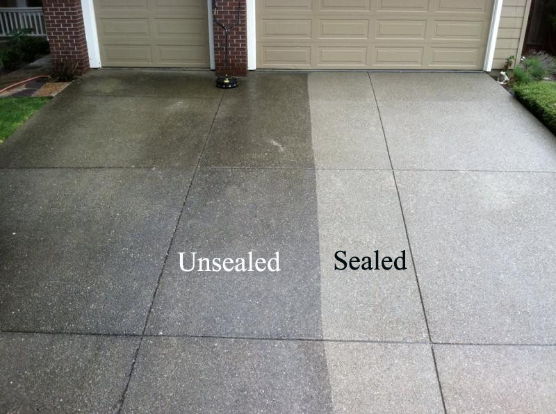 Freshly sealed concrete driveway with wet-look finish in North Georgia