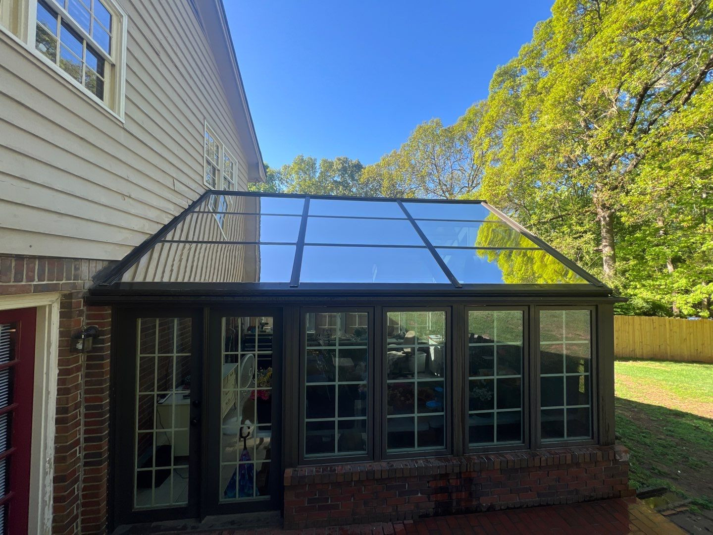 Professional window cleaning crew working on a home in North Georgia