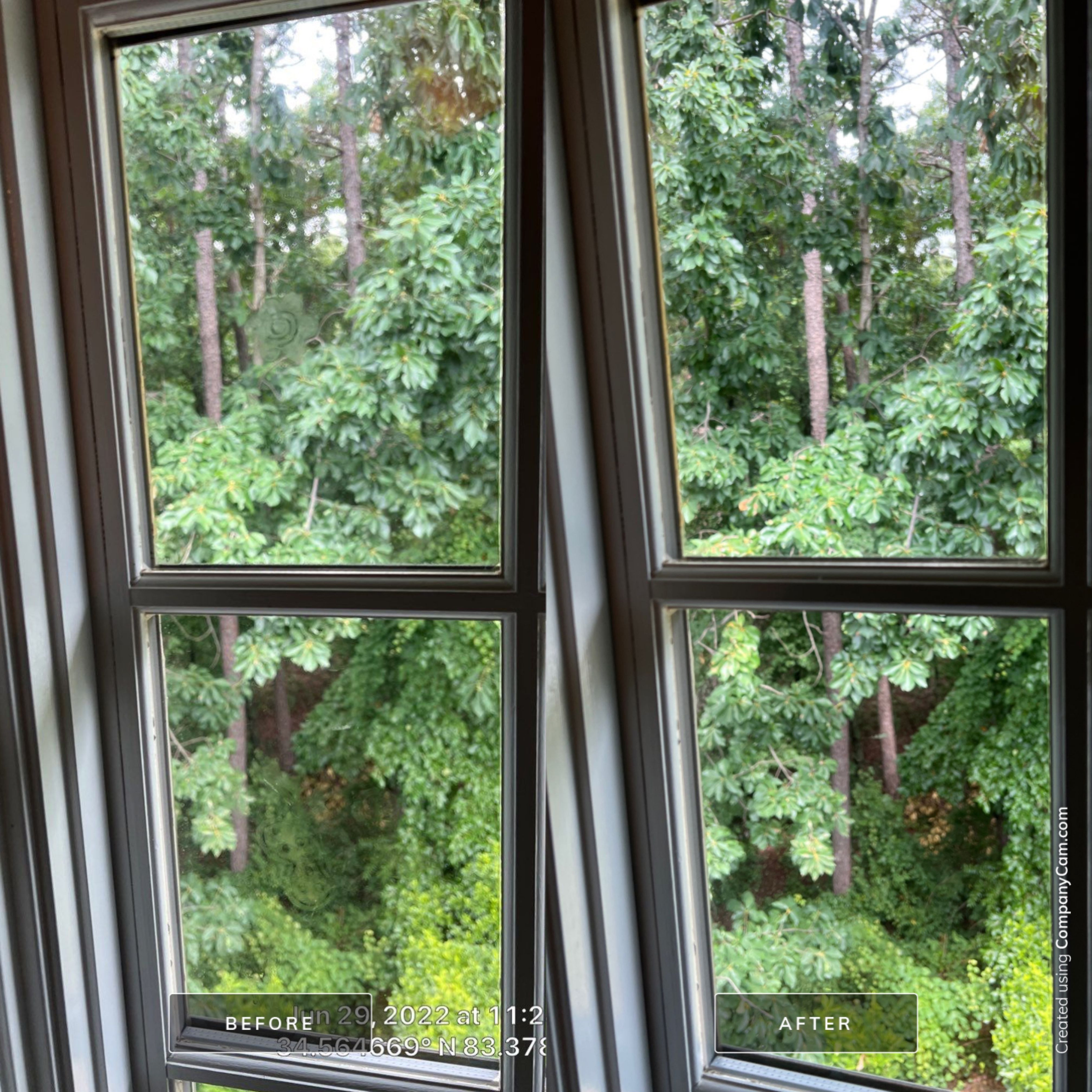 Window cleaning detail work showing streak-free results in Toccoa Georgia