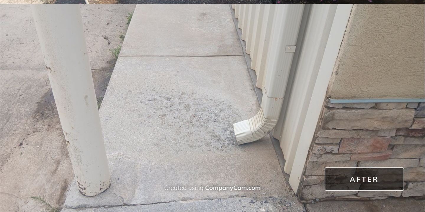 Clean concrete walkway after professional cleaning by Southern Exterior Cleaning in North Georgia